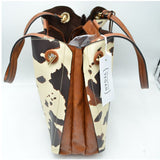 Cow print shoulder bag with tassel - black