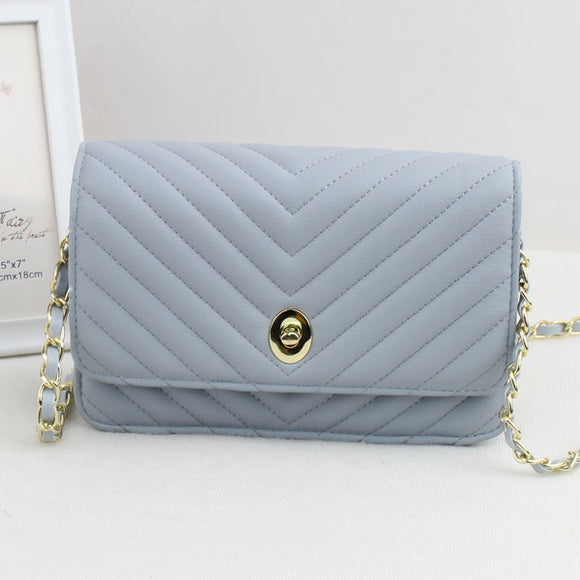 Quilted chevron chain crossbody bag - blue